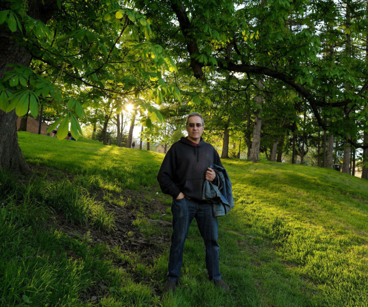 We were leaving the Tulip Festival in Albany in 2013 after a rain--as we were leaving, the sun breaking through made the grass and trees glow--I asked Don to walk up the hill a bit and took a quick shot.